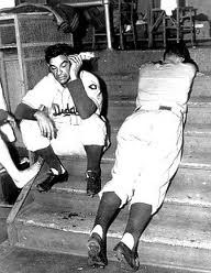 Branca disconsolate in the clubhouse.